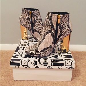 Black and white snakeskin boot heels